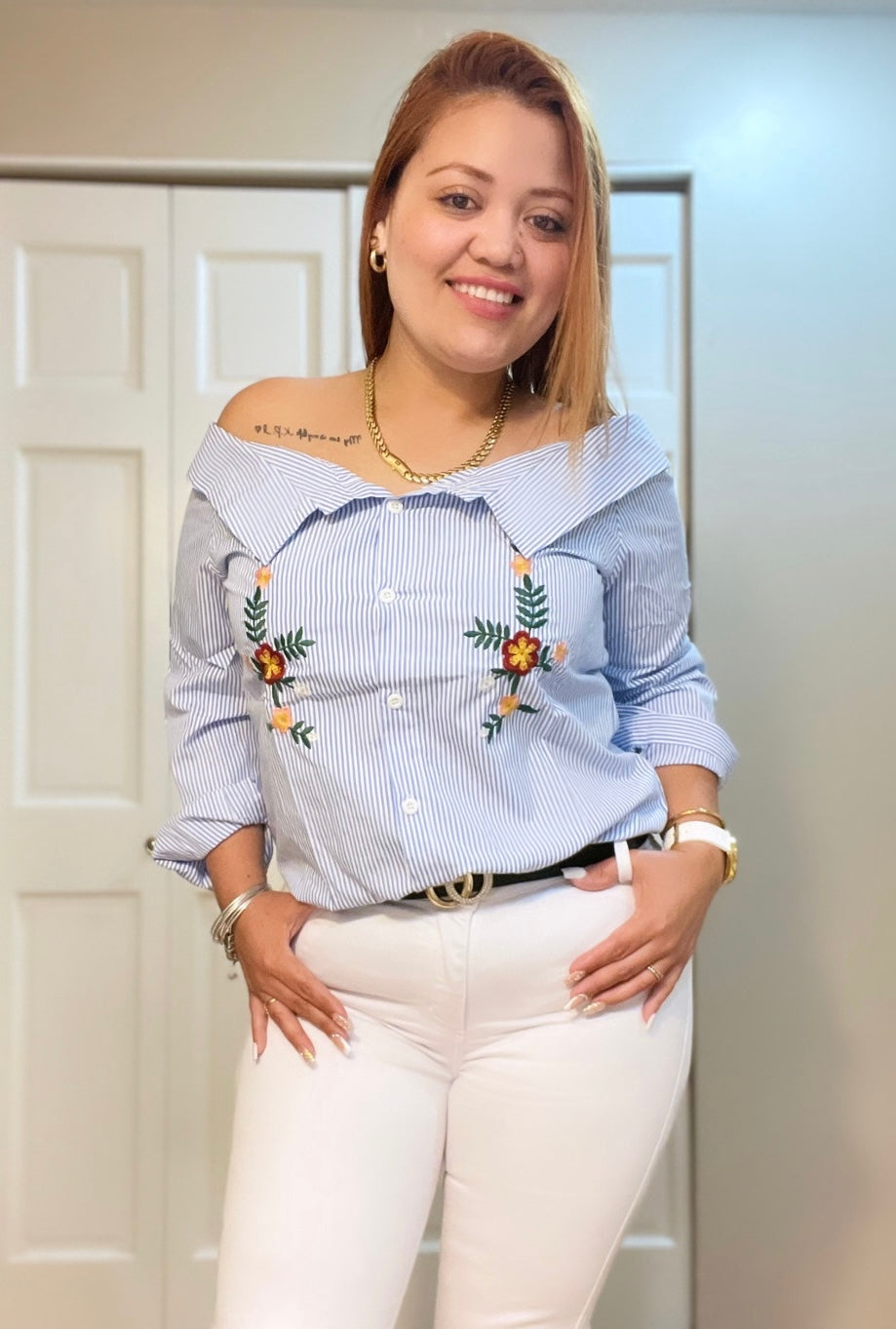 Blusa de rayas rosa ,azul